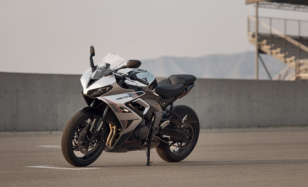 Triumph Daytona 660 in silver, parked at the track