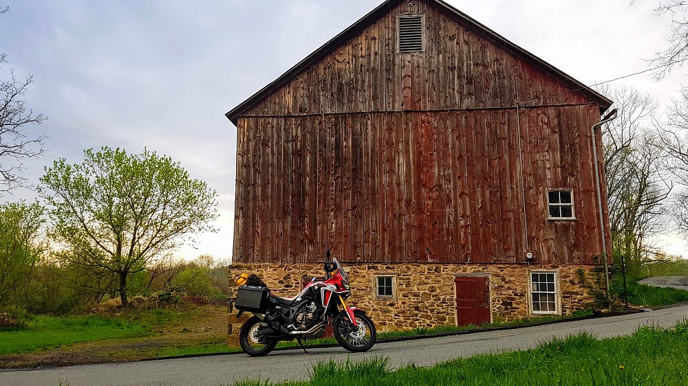 AT by a barn