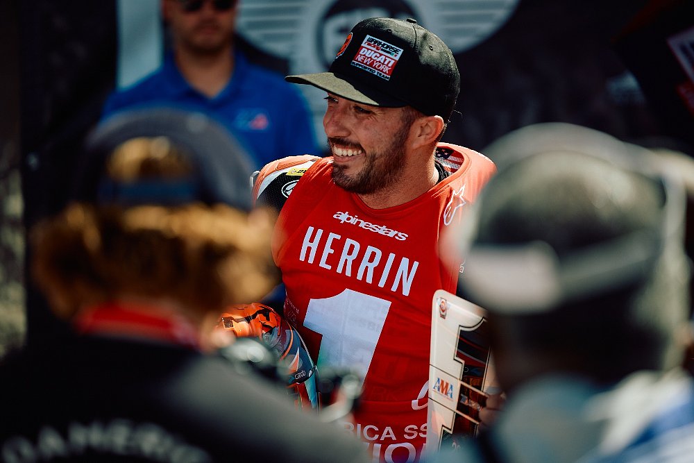 Smiling Josh Herrin celebrates his Supersport championship