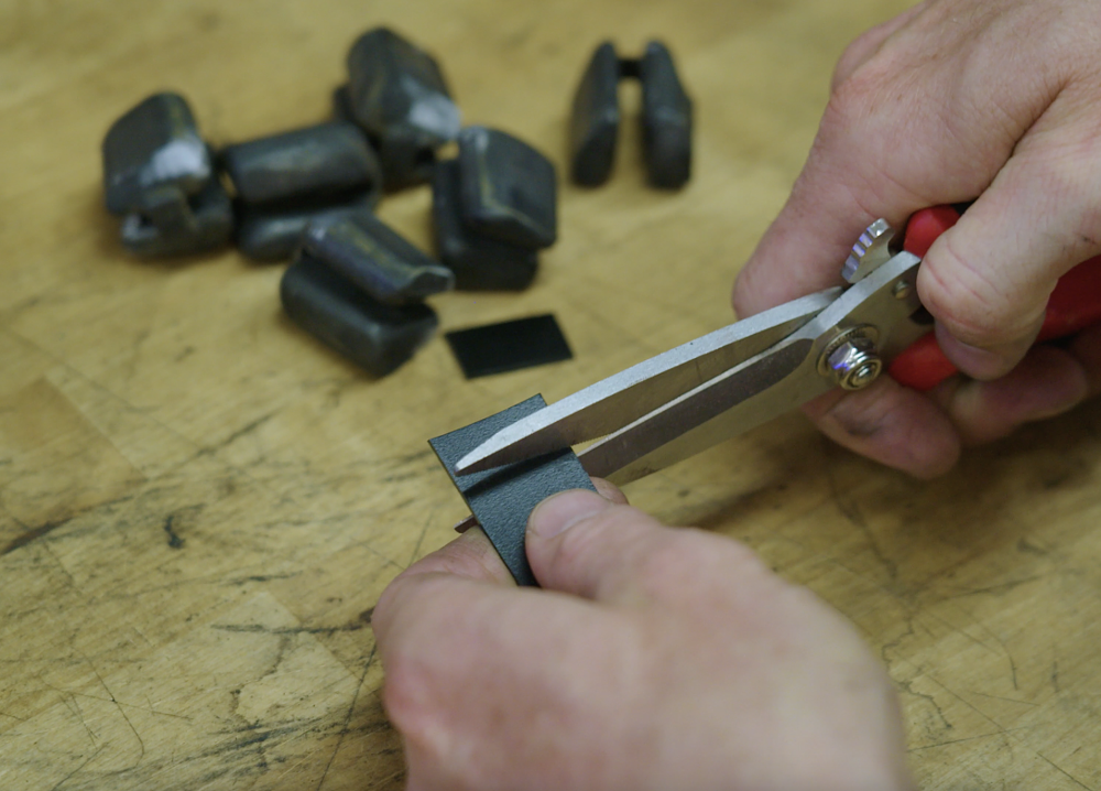 Cutting shims to remove play in a motorcycle cush drive